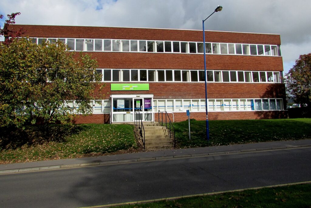 A flight of steps leading up to the entrance of a Jobcentre Plus office