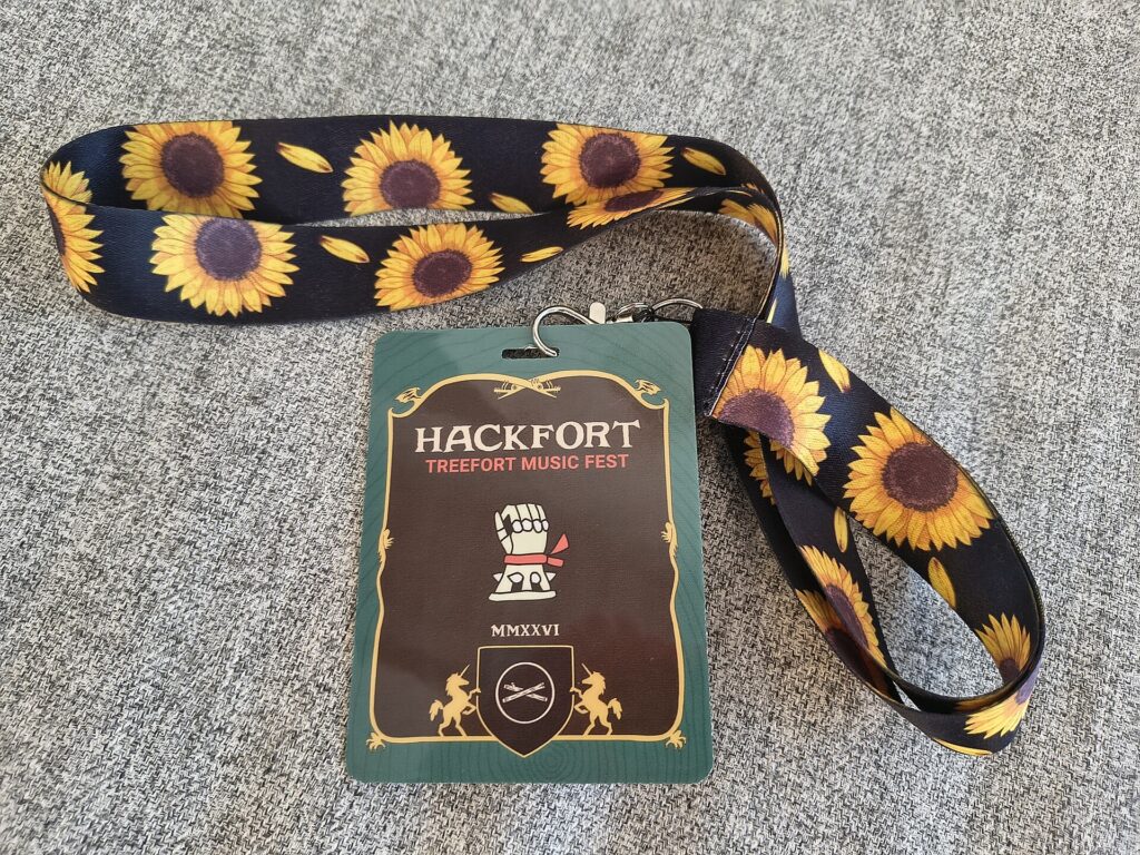 A Hidden Disabilities Sunflower lanyard with its yellow sunflower pattern