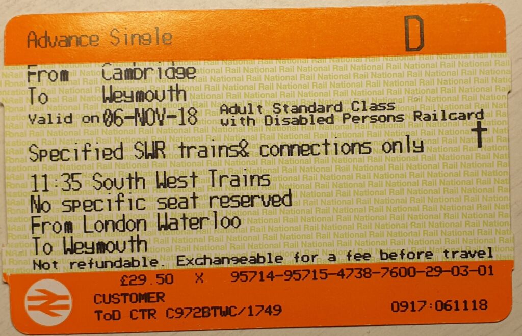 An orange National Rail ticket printed with Disabled Persons Railcard